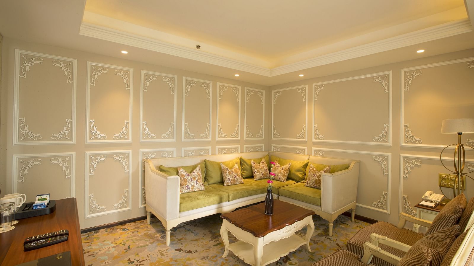 Living area with furniture and a table arranged for family relaxation