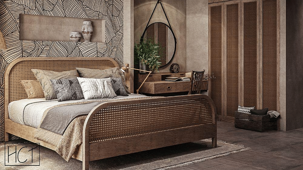 A spacious room featuring a large bed and a wall-mounted cupboard to the side at The Evren, Vagator.