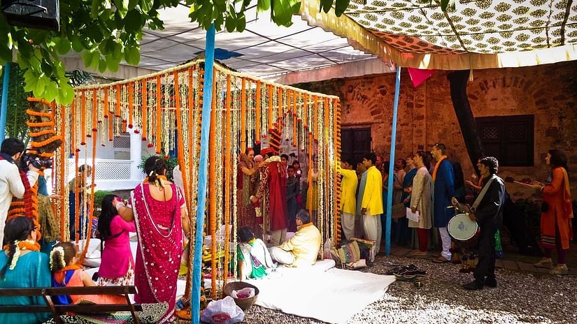 Hill Fort Kesroli 14th Century Alwar - Image of people taking part in a traditional Indian wedding ceremony