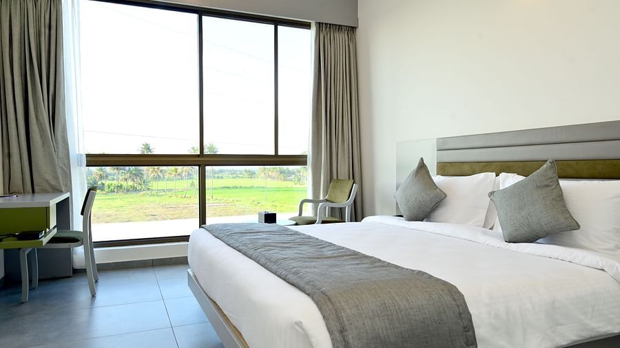 Well lit Deluxe Room with Garden View 6 - Clarks Inn Express, KRS Road, Mysore