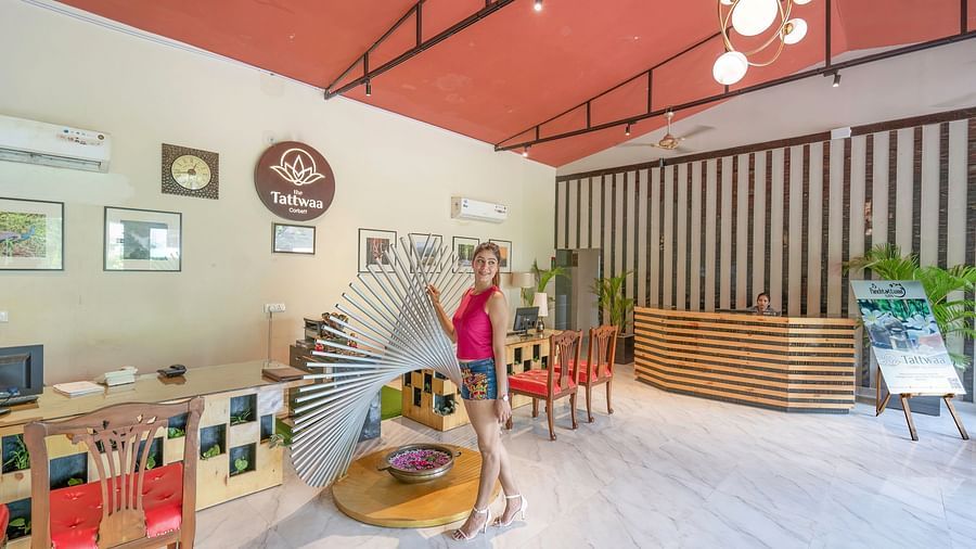 Welcoming lobby and reception area with wall decors at The Tattwaa Corbett Spa & Resort.