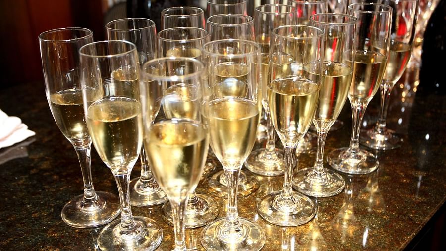 An array of sparkling champagne glasses placed on a table - Brewery Gulch Inn & Spa