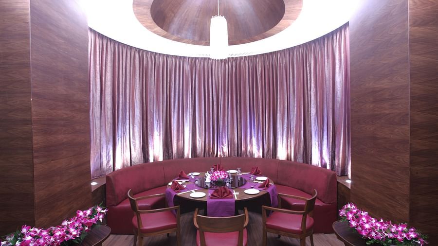 a table at Oriental Bowl Bar and Specialty Restaurant in Madh Island