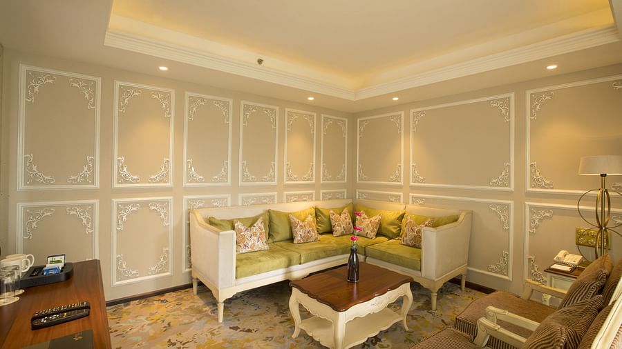 Living area with furniture and a table arranged for family relaxation