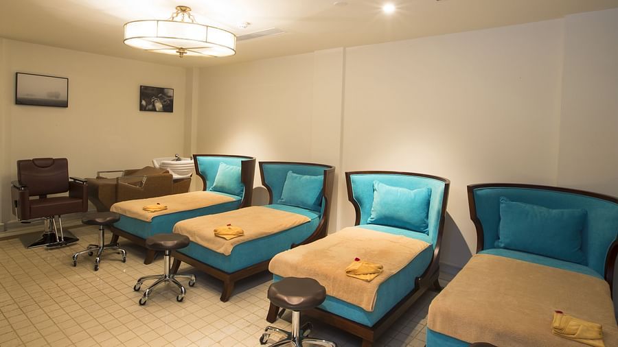 Spa area at Fragrant Nature Cochin with seating meticulously arranged and ready for guests