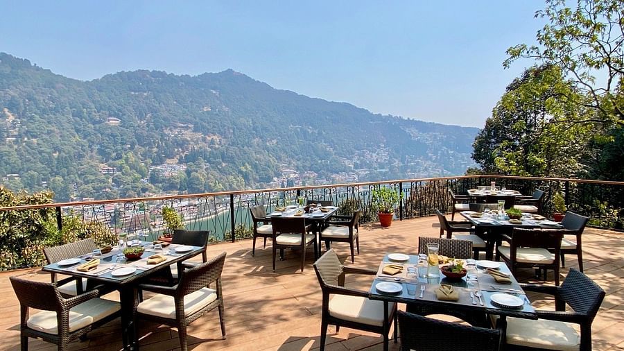 An al fresco sitting at the restaurant during the day - the naini retreat, nainital.