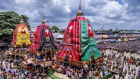 Rath yatra with a large group of people standing in front of a crowd