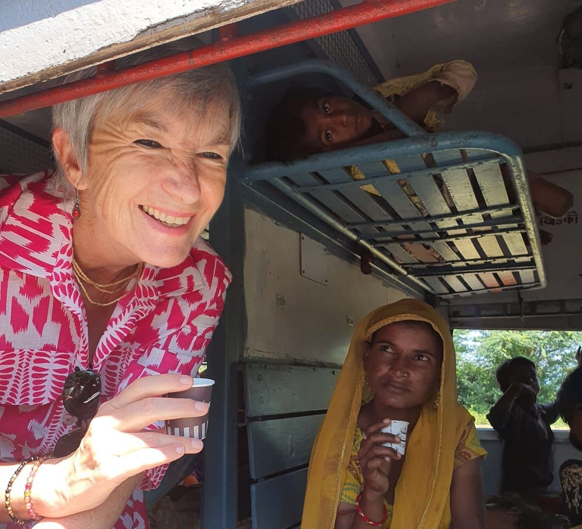 foreign Tourists travelling in a local train in rajasthan