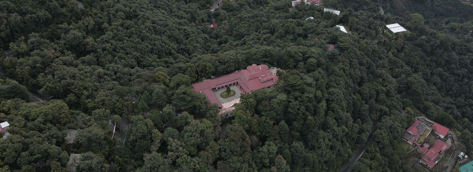 A hotel nestled in the middle of a lush green jungle - The Claridges Nabha Residence, Mussoorie