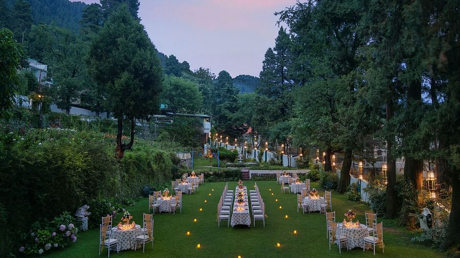 A peaceful garden with colorful flowers and manicured lawns.