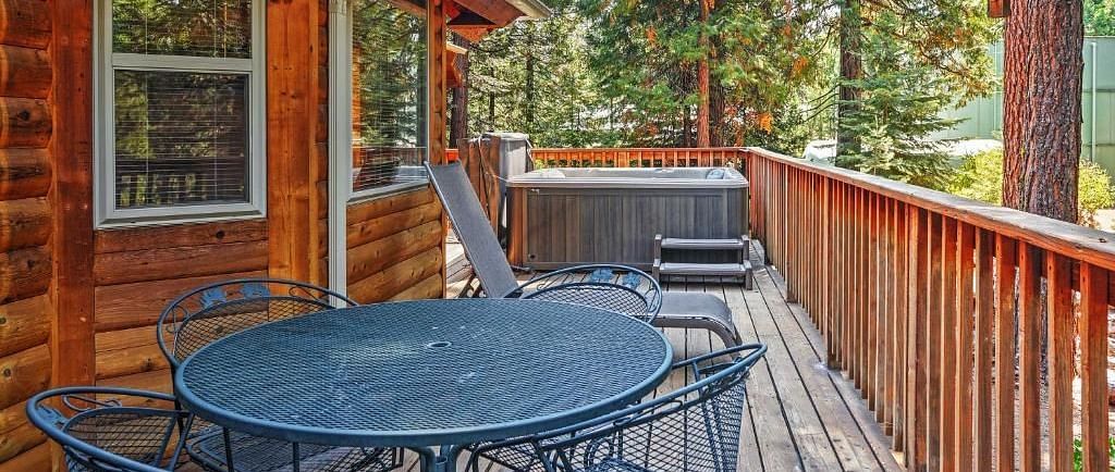 A coffee table arrangement in the deck of a cabin at Shaver Lake Village Hotel.