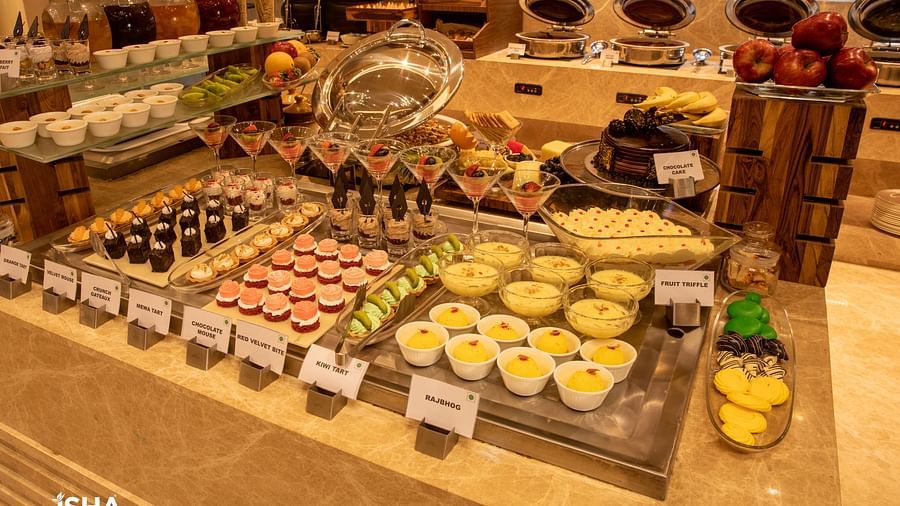 A detailed view of a dessert or pastry display at The Gaurs Sarovar Premiere, showcasing a tempting array of sweets.