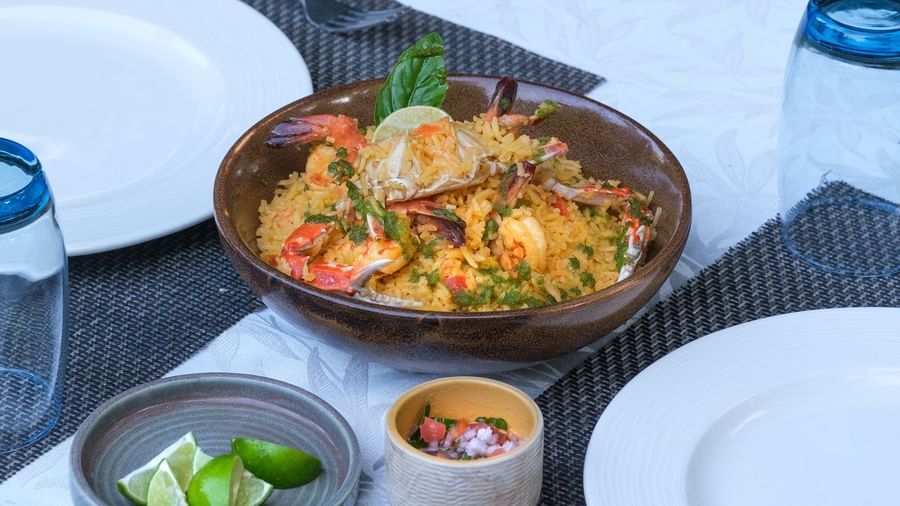  A plate of Paella kept on a table | Mango Hill, Pondicherry
