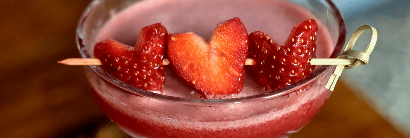 Refreshing red cocktail garnished with strawberries served at Accord Puducherry.