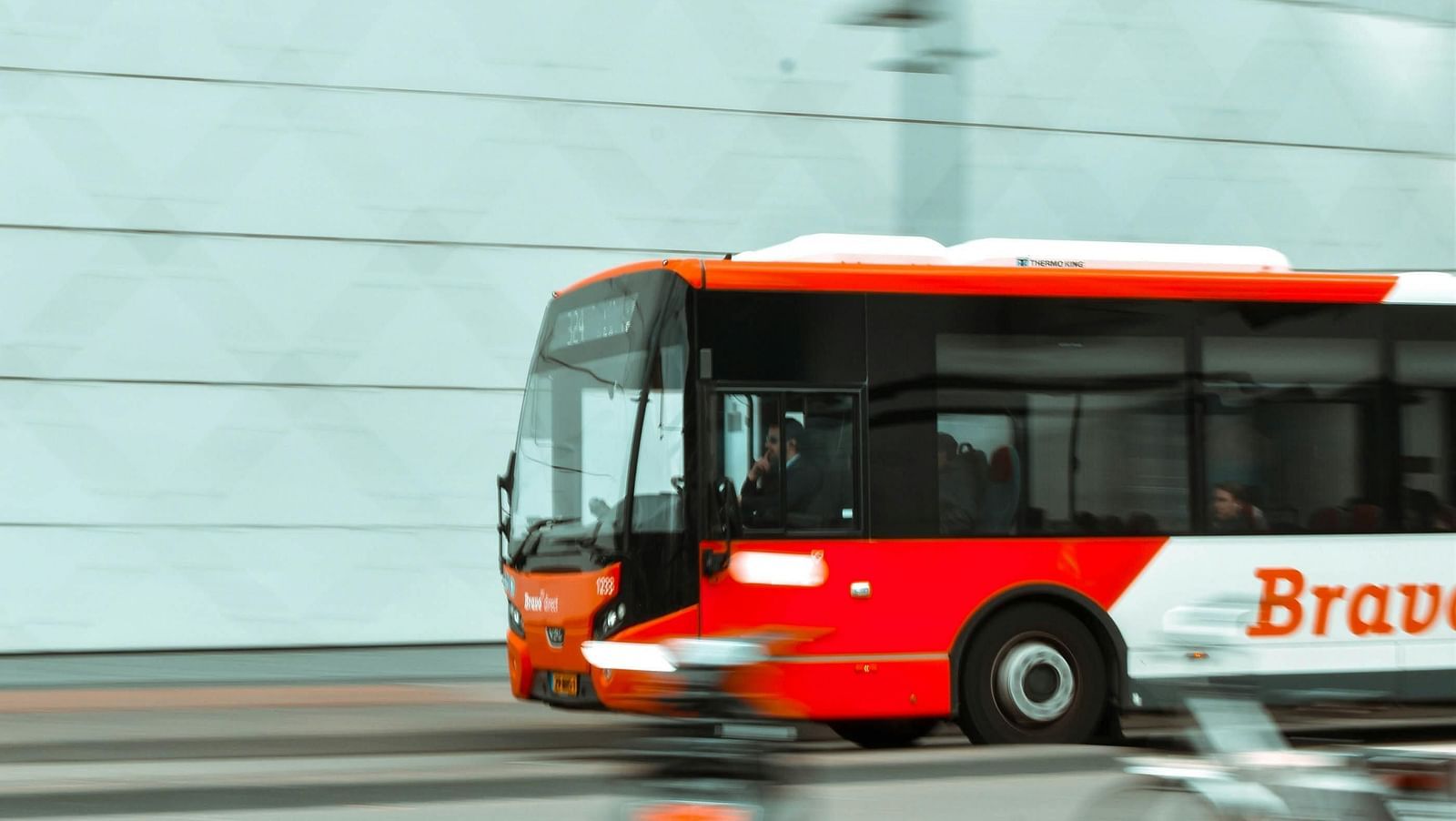 A bus running on a road
