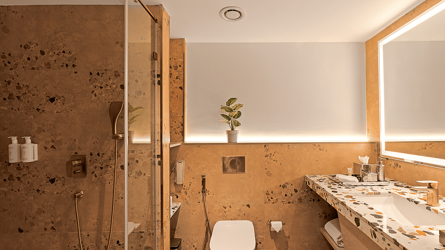 A view of the restroom in one of the rooms at Cloud9 Sarovar Premiere, Palolem Goa, featuring modern fixtures and a clean, sleek design
