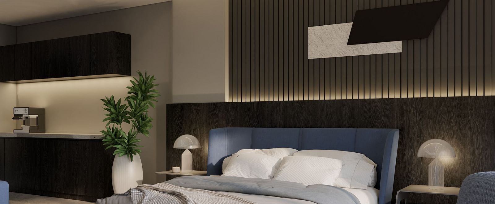 A stylish hotel suite with a plush bed, sleek decor, and ambient lighting at Town Square Suites.