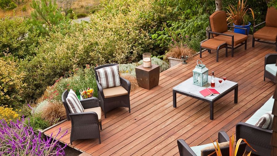 A scenic wooden deck with seating, offering panoramic views - Brewery Gulch Inn & Spa