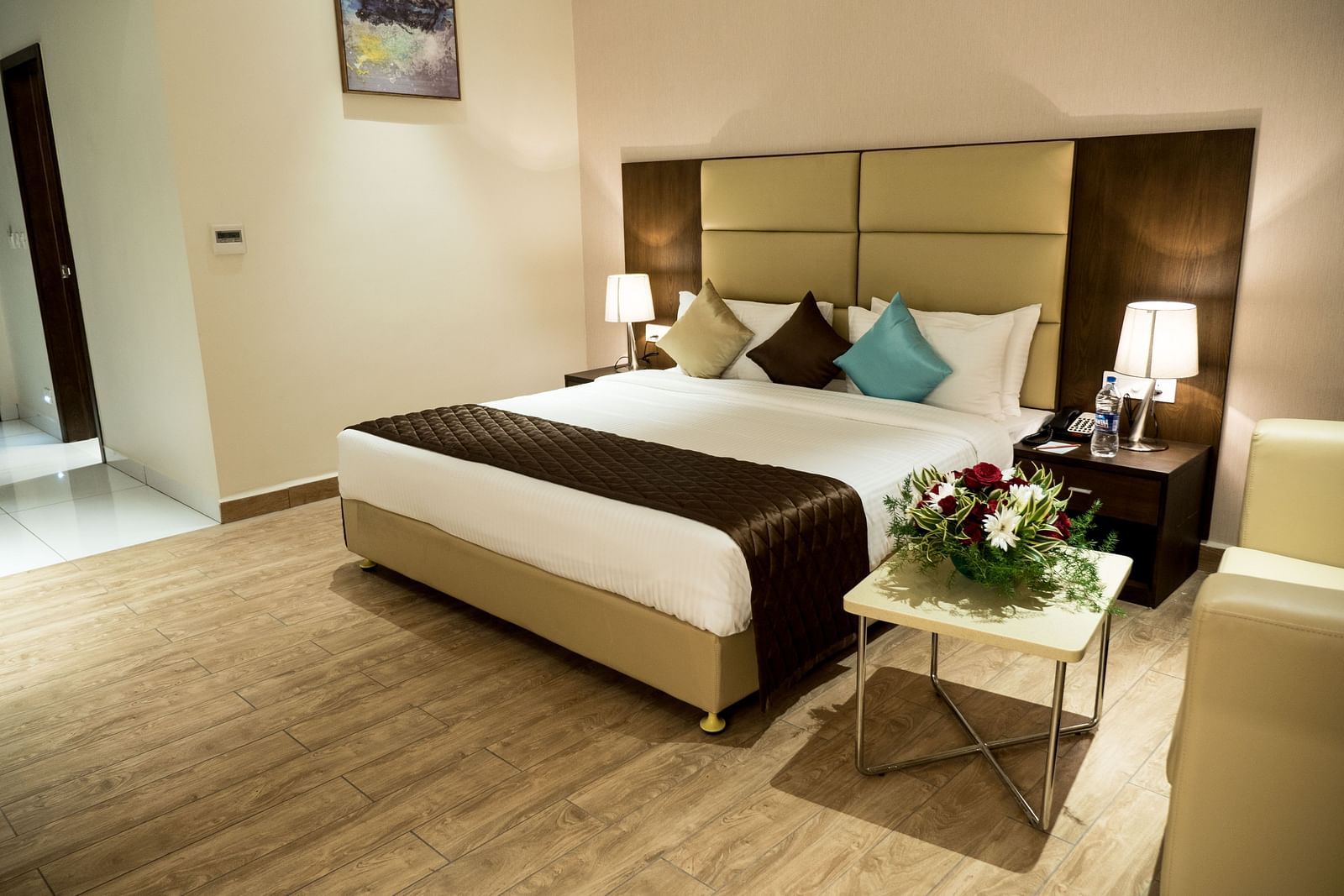 A large bed in Premium Room at Grand Ashok, Thanjavur.