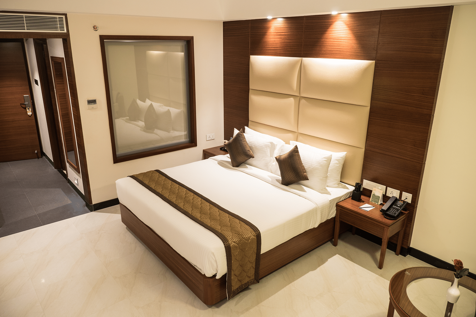 view of king size bed of Luxury Room of MM Legacy, Kanchipuram