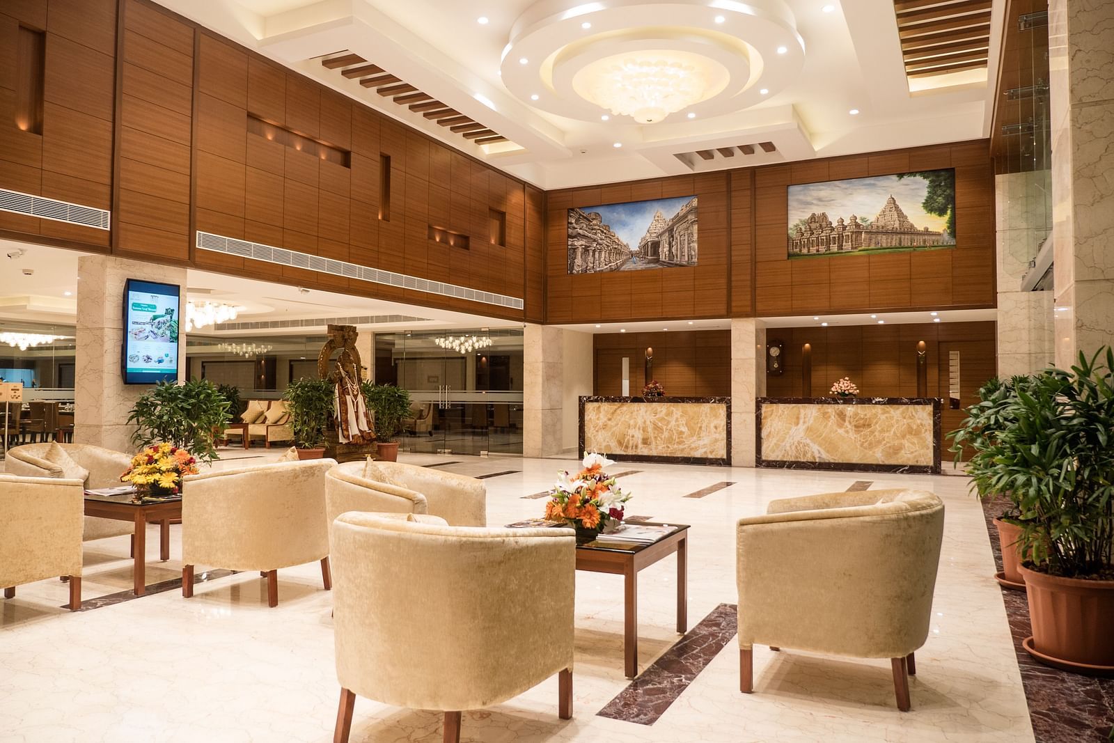 reception area with comfortable seating and warm lights of MM Legacy, Kanchipuram