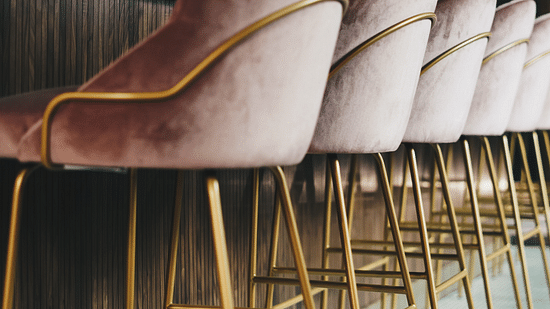 Pastel pink chairs kept elegently