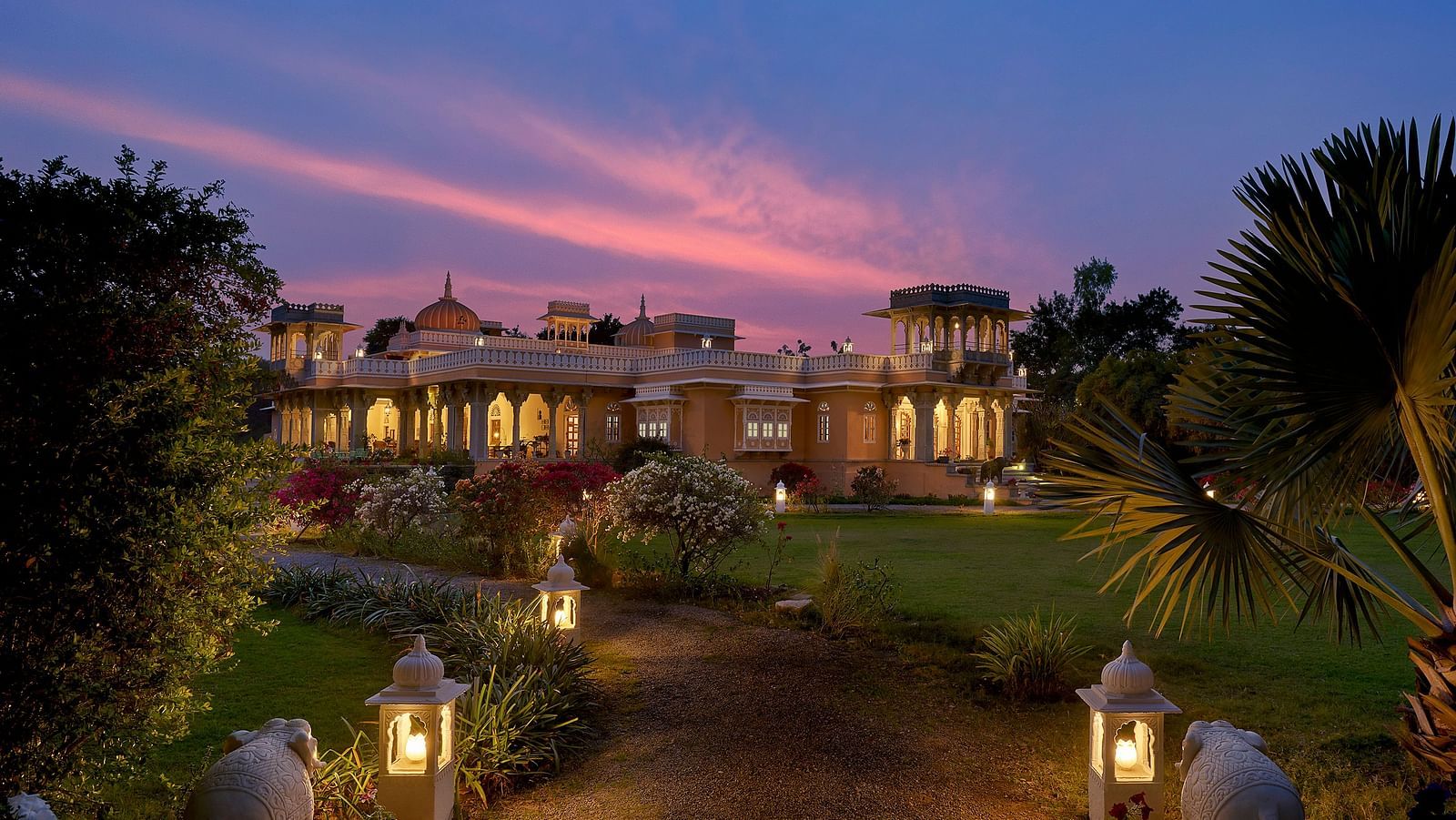 Facade image of Dev Shree, deogarh featuring a beutiful sunset in the background