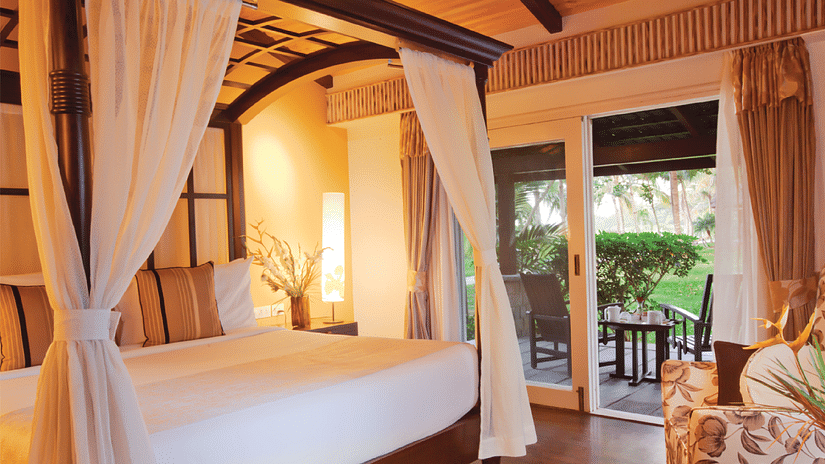 interior of a bedroom at The Serai Kabini-19