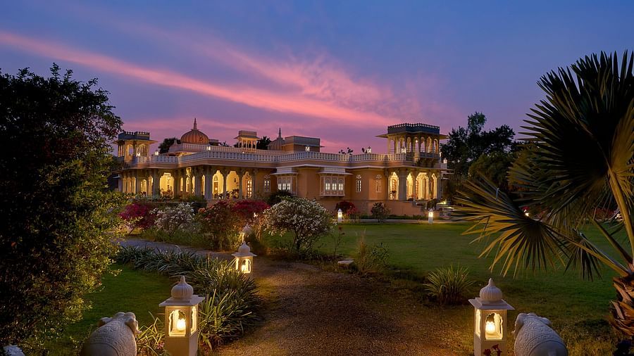 Facade image of Dev Shree, deogarh featuring a beutiful sunset in the background
