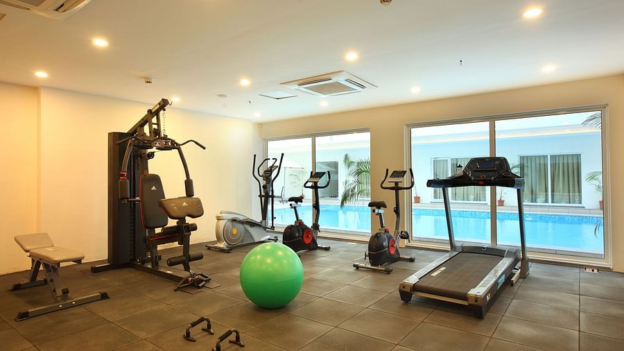 Overview of the Gymnasium with eqipment in view - Starlit Suites, Kochi