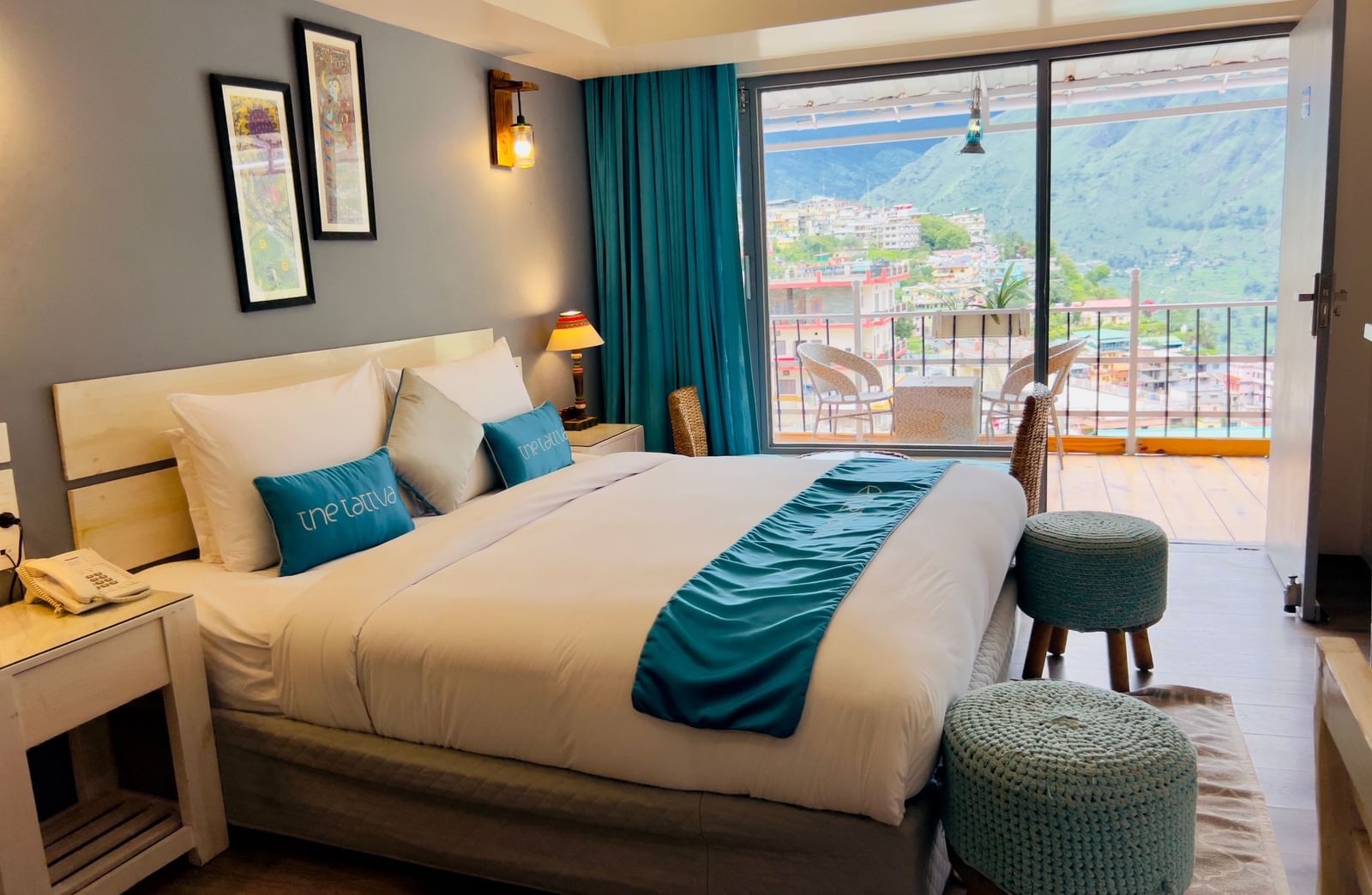 image featuring a plush double bed in the premium room with an amazing valley view - The Tattva Boutique Resort