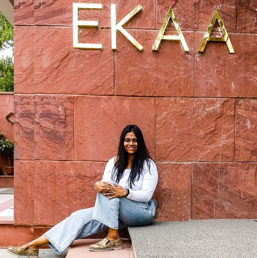 Architect Ipsita in front of the facade of Ekaa Villa & Kitchen