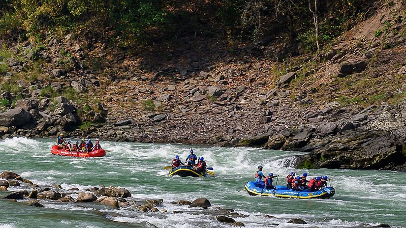 a Group of people River Rafting