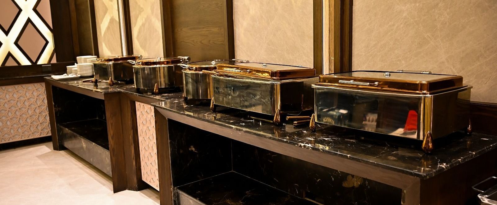 Close up view of buffet boxes arranged on the table at BluSalzz Residence, Amritsar