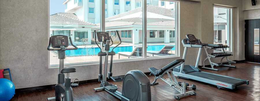 an image of a well-equipped gym at The Residency Towers Rameswaram