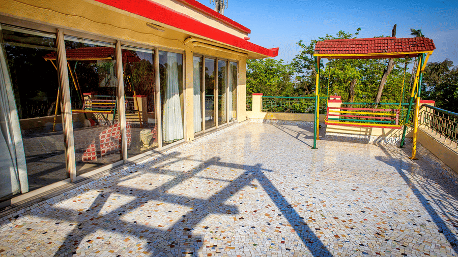 The terrace of the Royal Suite of the resort with a swing.