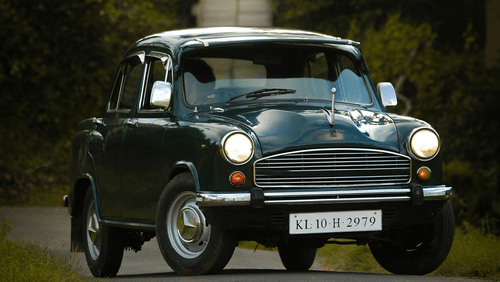 A vintage black ambassador on the road