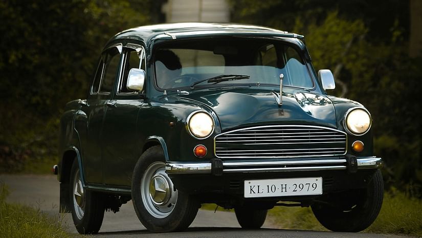 A vintage black ambassador on the road