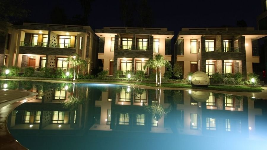 Resort cottages overlooking a swimming pool