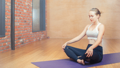 A women meditating in a quiet room