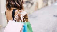 woman holding shopping bags