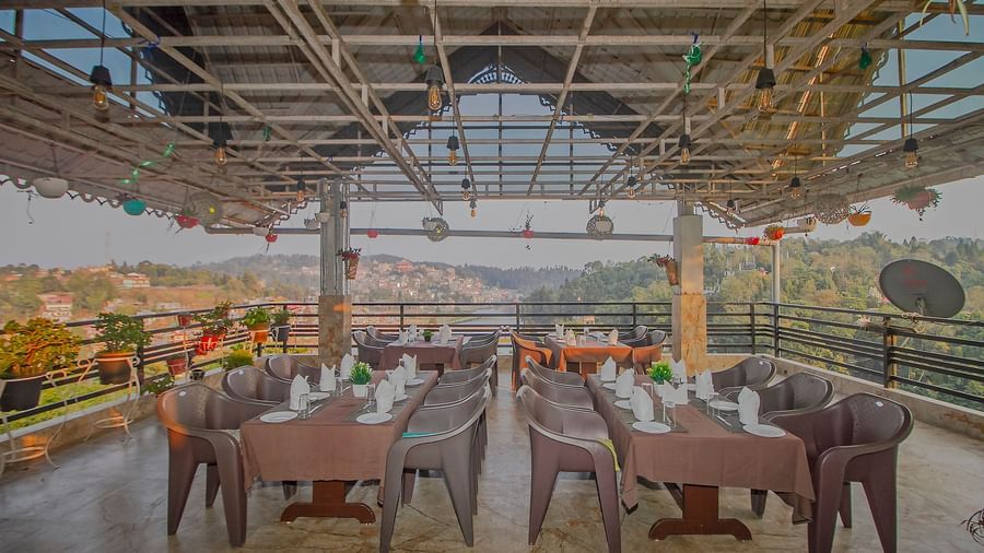 image of outdoor restaurant at  Mount Queen Hills resort