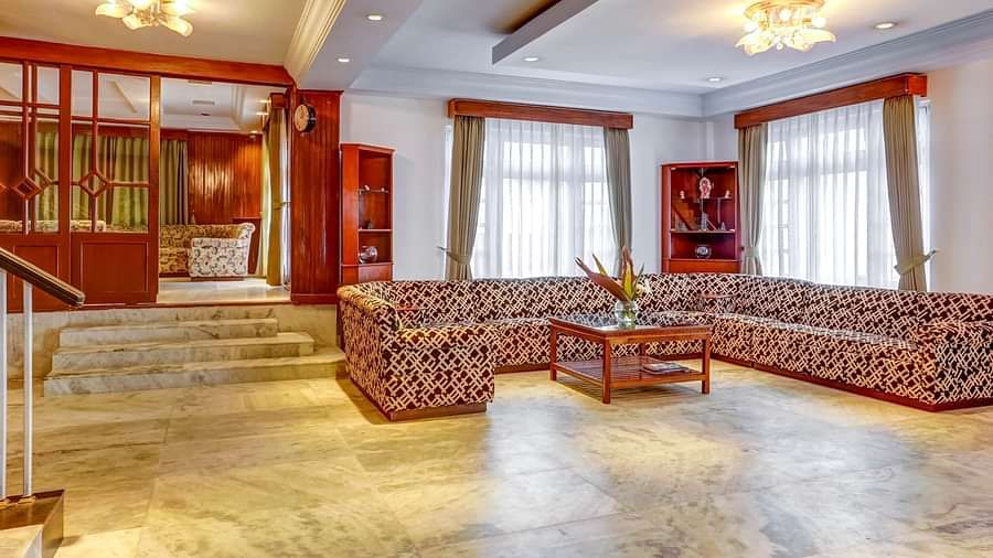 Image of a lobby with seating area and a table in front at Summit Tashi Ghang Heritage Resort, Pelling