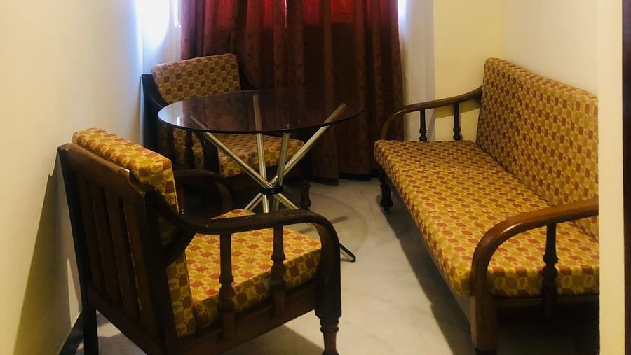 View of separate seating area in  Suite with cosy interior - Jayaram Hotel, Pondicherry