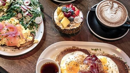 An image of a table where various dishes are placed | Ocean Sprays