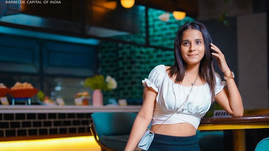 An image of a woman posing at Themis Barbecue House, Panipat