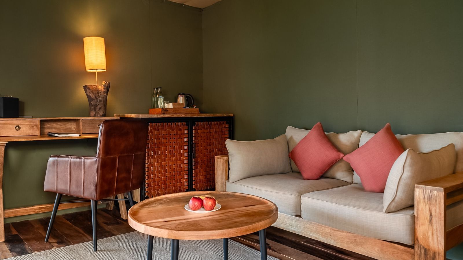 A sofa and a small tea table at Trees N Tigers, Tadoba.