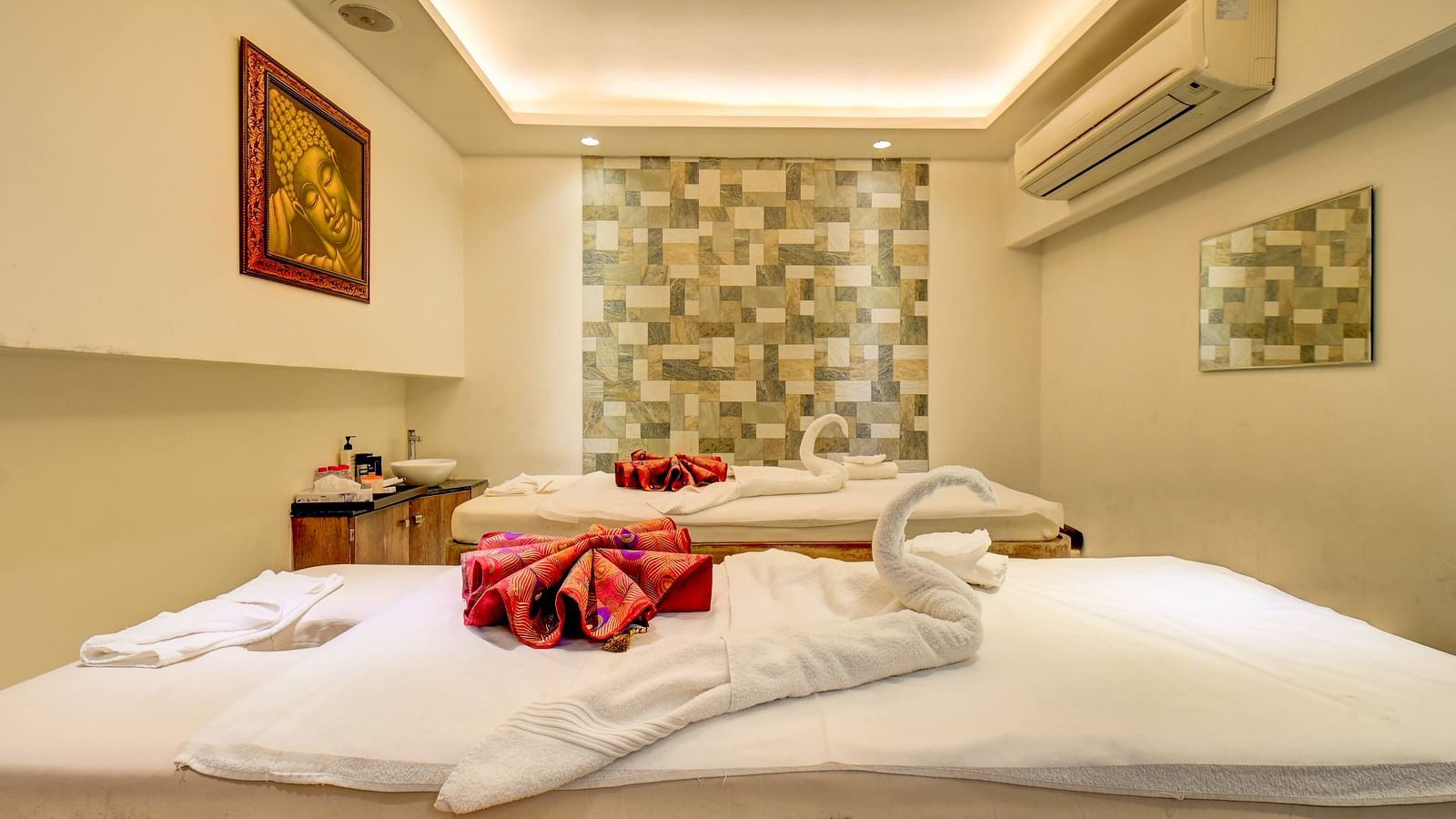 Luxurious spa treatment room setup with mirrors at the SSK spa 