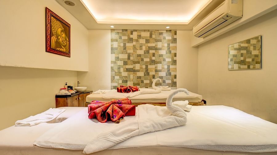Luxurious spa treatment room setup with mirrors at the SSK spa 