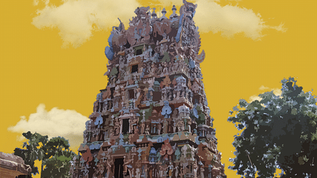 Richly sculpted entrance of a temple with warm tones and layered design.